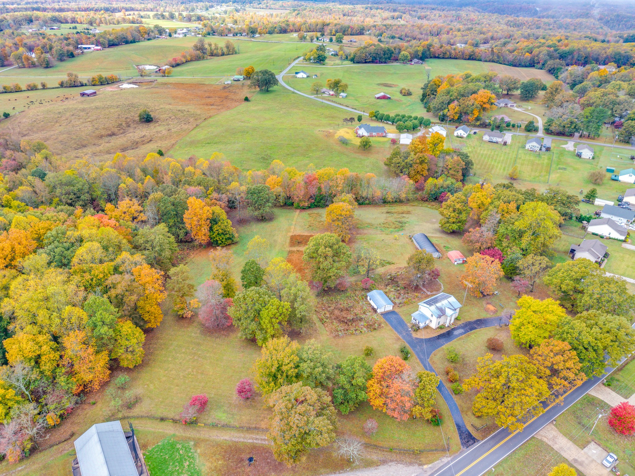 5881 Burgess Falls Road Sparta, TN 38583 - Photo 3 of 29 an aerial view of residential houses with outdoor space