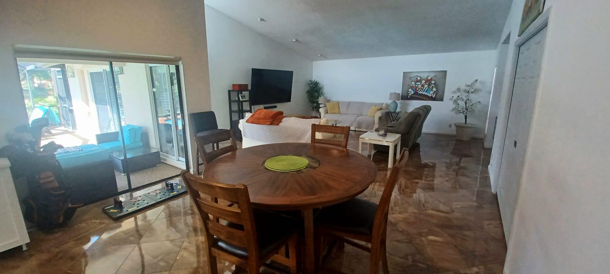 10544 Fenway Place Boca Raton, FL 33498 - Photo 14 of 28 a view of a dining room with furniture