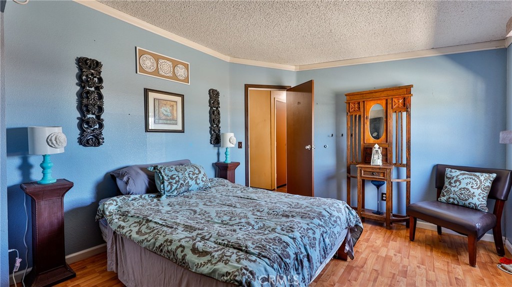 39550 Kirby Road Anza, CA 92539 - Photo 37 of 53 a bedroom with a bed and a table in it