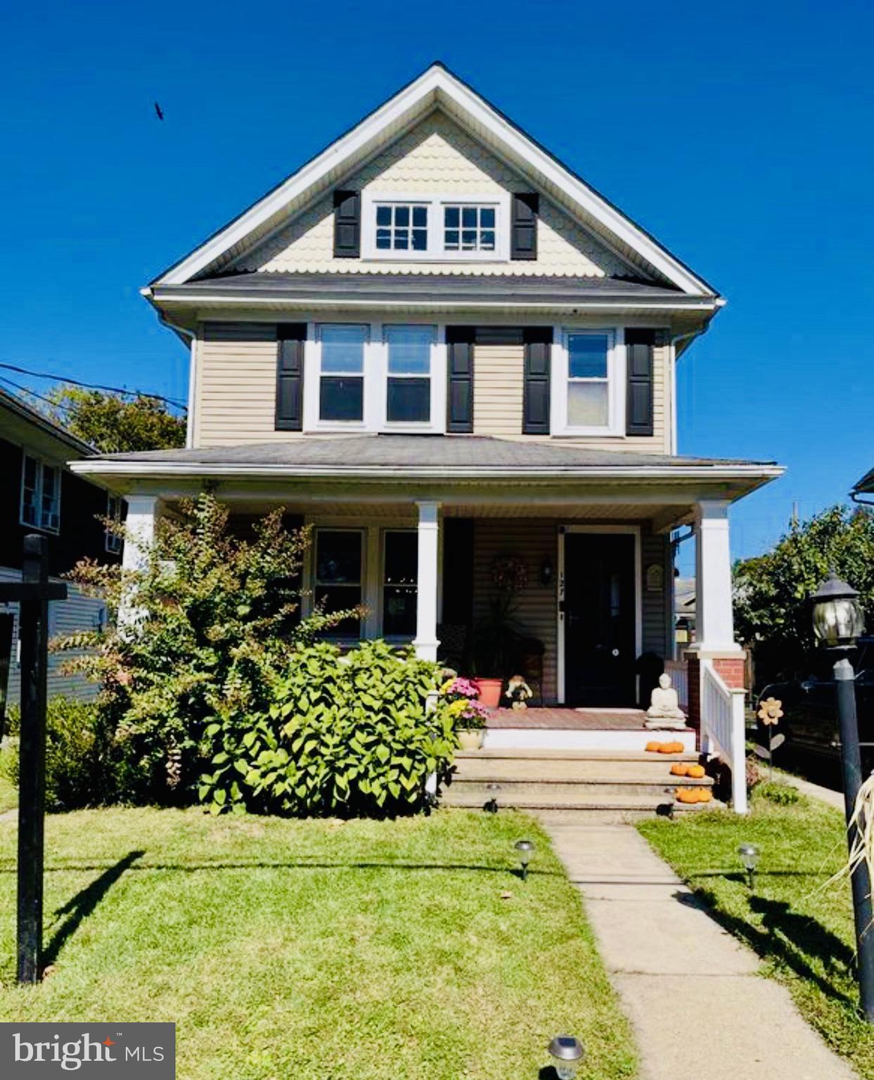 127 Sycamore Road Riegelsville, PA 18077 - Photo 1 of 34 a front view of a house with a yard