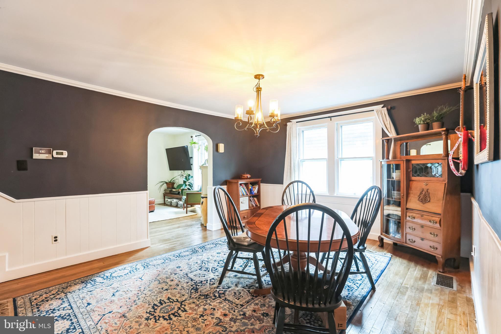 127 Sycamore Road Riegelsville, PA 18077 - Photo 12 of 34 a view of a dining room with furniture and wooden floor