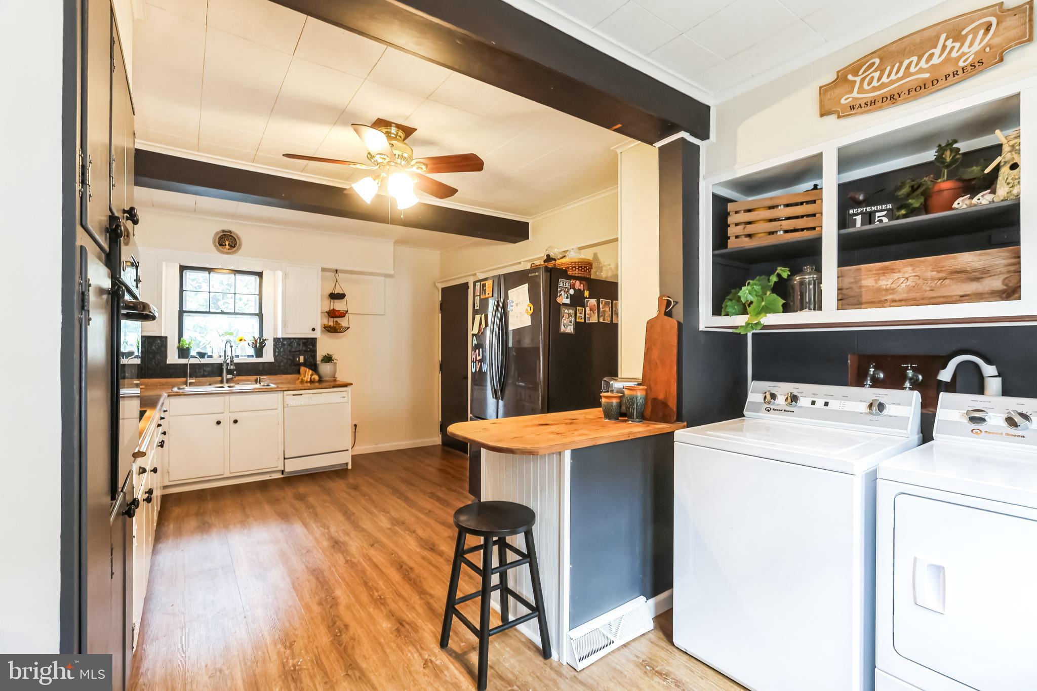 127 Sycamore Road Riegelsville, PA 18077 - Photo 15 of 34 a view of a kitchen with a sink and a refrigerator