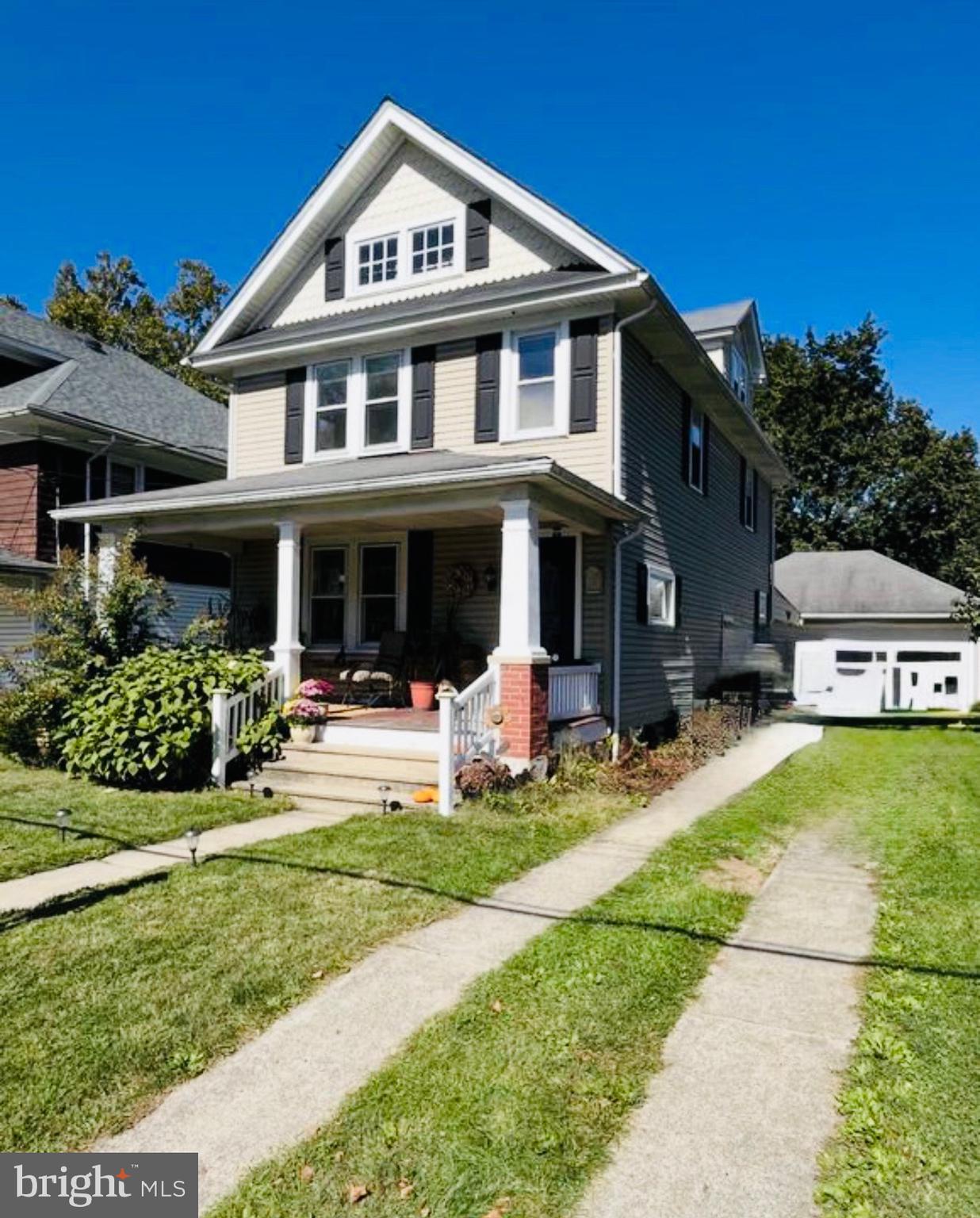 127 Sycamore Road Riegelsville, PA 18077 - Photo 2 of 34 a front view of a house with a yard and porch