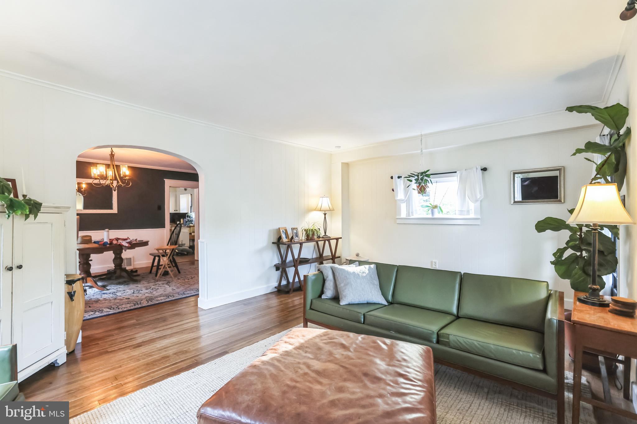 127 Sycamore Road Riegelsville, PA 18077 - Photo 10 of 34 a living room with furniture and a wooden floor