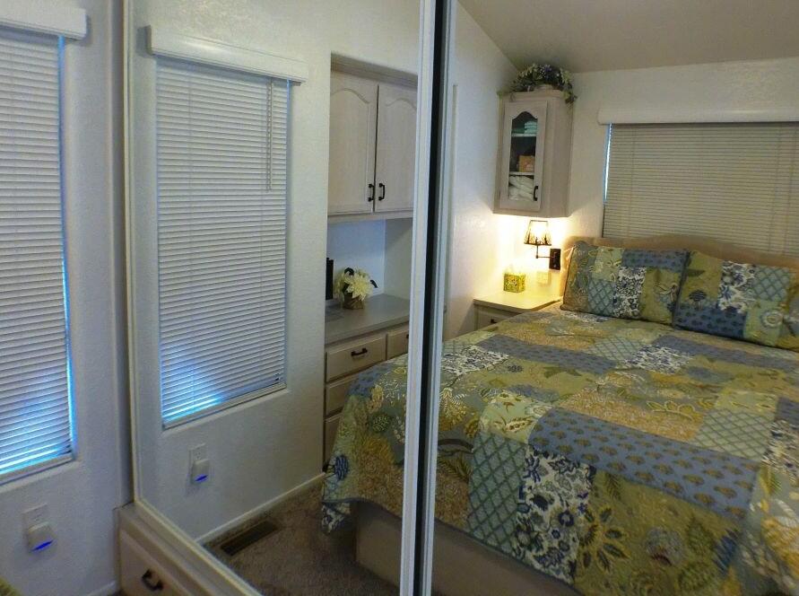 84136 Ave 44, Unit 628 Indio, CA 92203 - Photo 31 of 34 a bathroom with a sink toilet and shower
