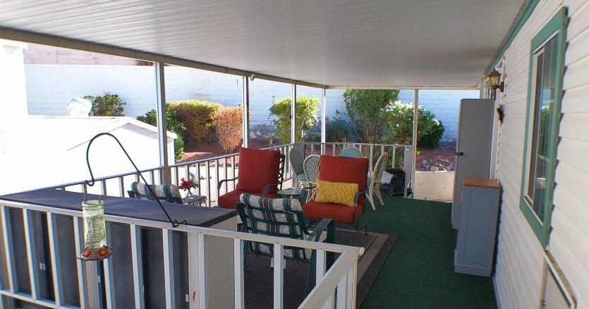84136 Ave 44, Unit 628 Indio, CA 92203 - Photo 5 of 34 a view of a porch with furniture