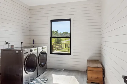 a bathroom with a sink and mirror
