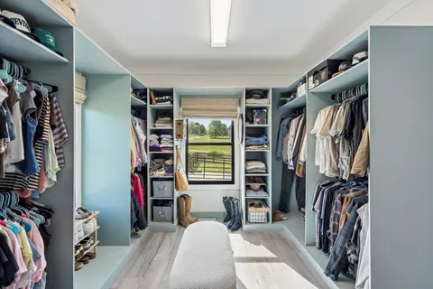 a view of large windows with a flat screen tv
