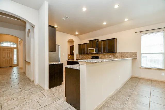 a view of living room with furniture and flat screen tv