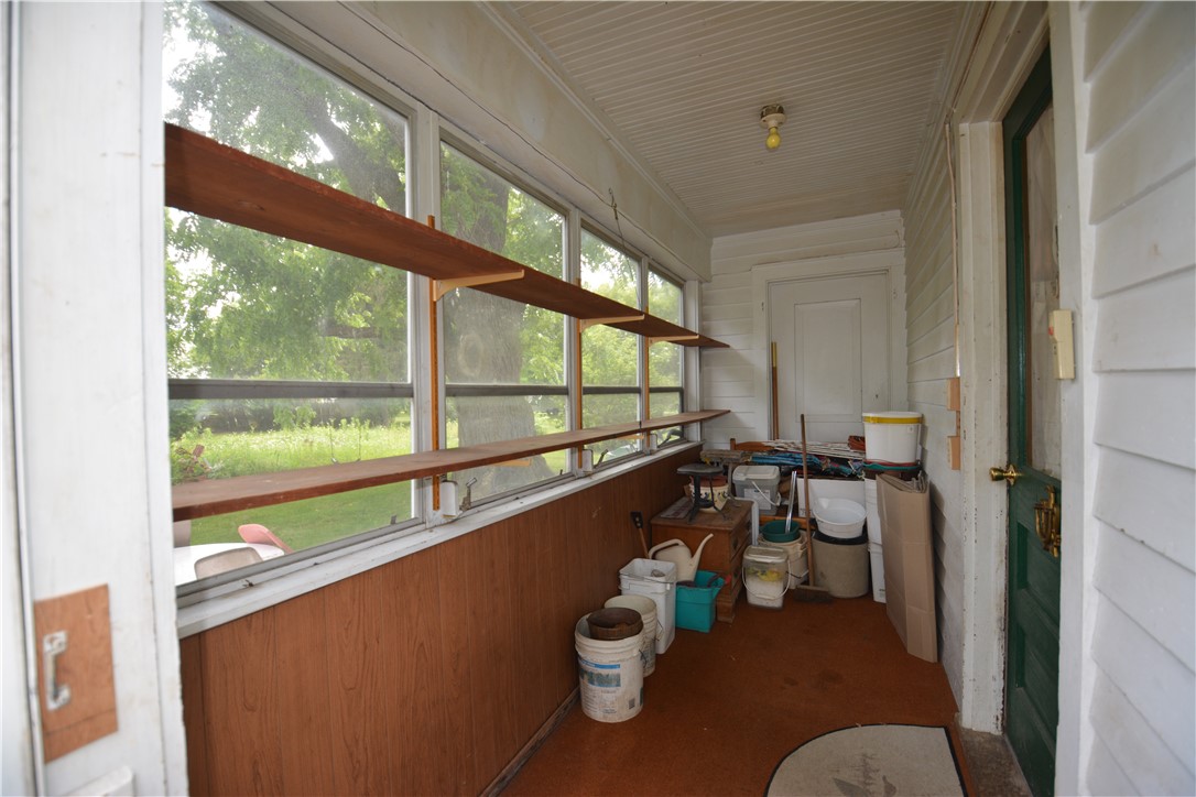 1215 Rush Scottsville Road Rush, NY 14543 - Photo 10 of 32 Back enclosed porch