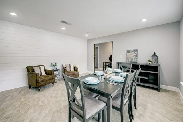 a view of a dining room with furniture