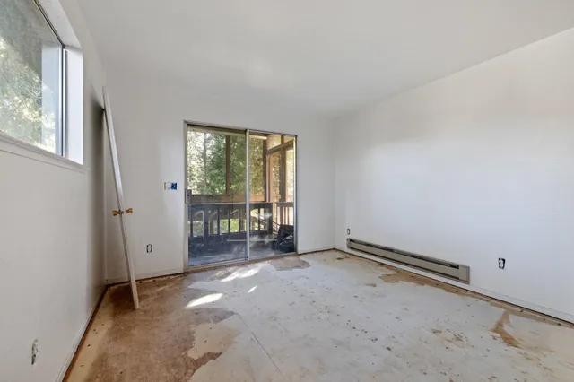 an empty room with windows