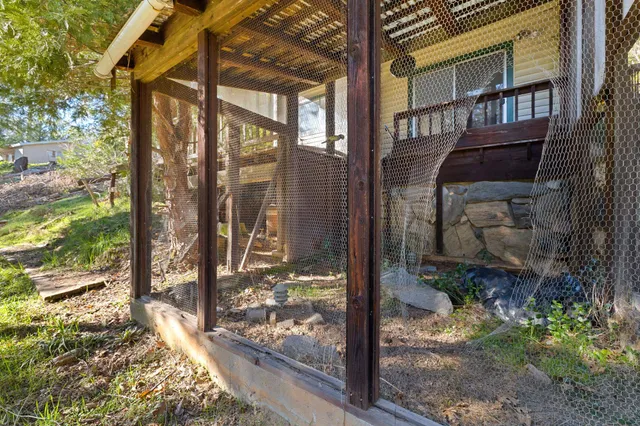 a backyard of a house with lots of green space