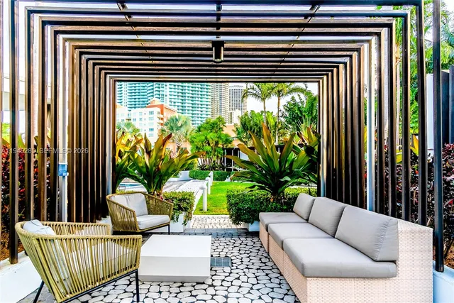 a view of a porch with furniture