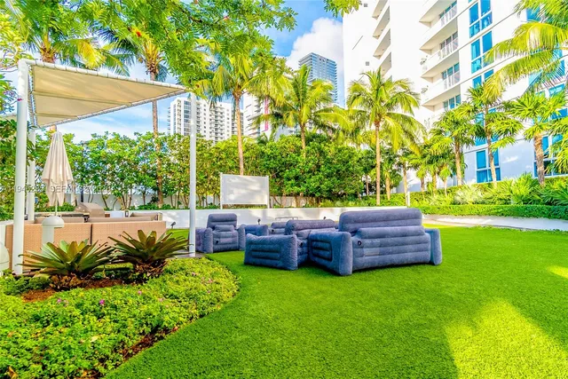 a garden view with a seating space
