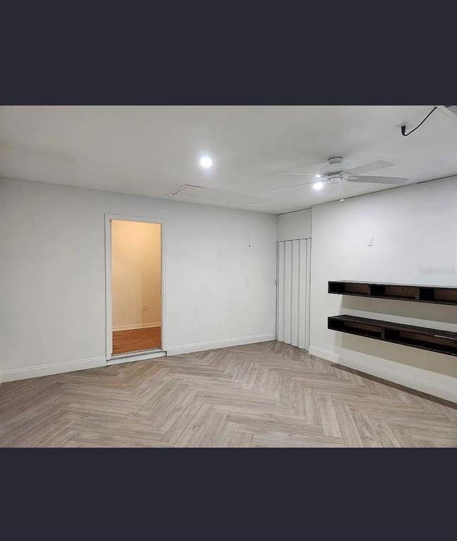 10154 Henderson Street Spring Hill, FL 34608 - Photo 15 of 19 a view of an empty room