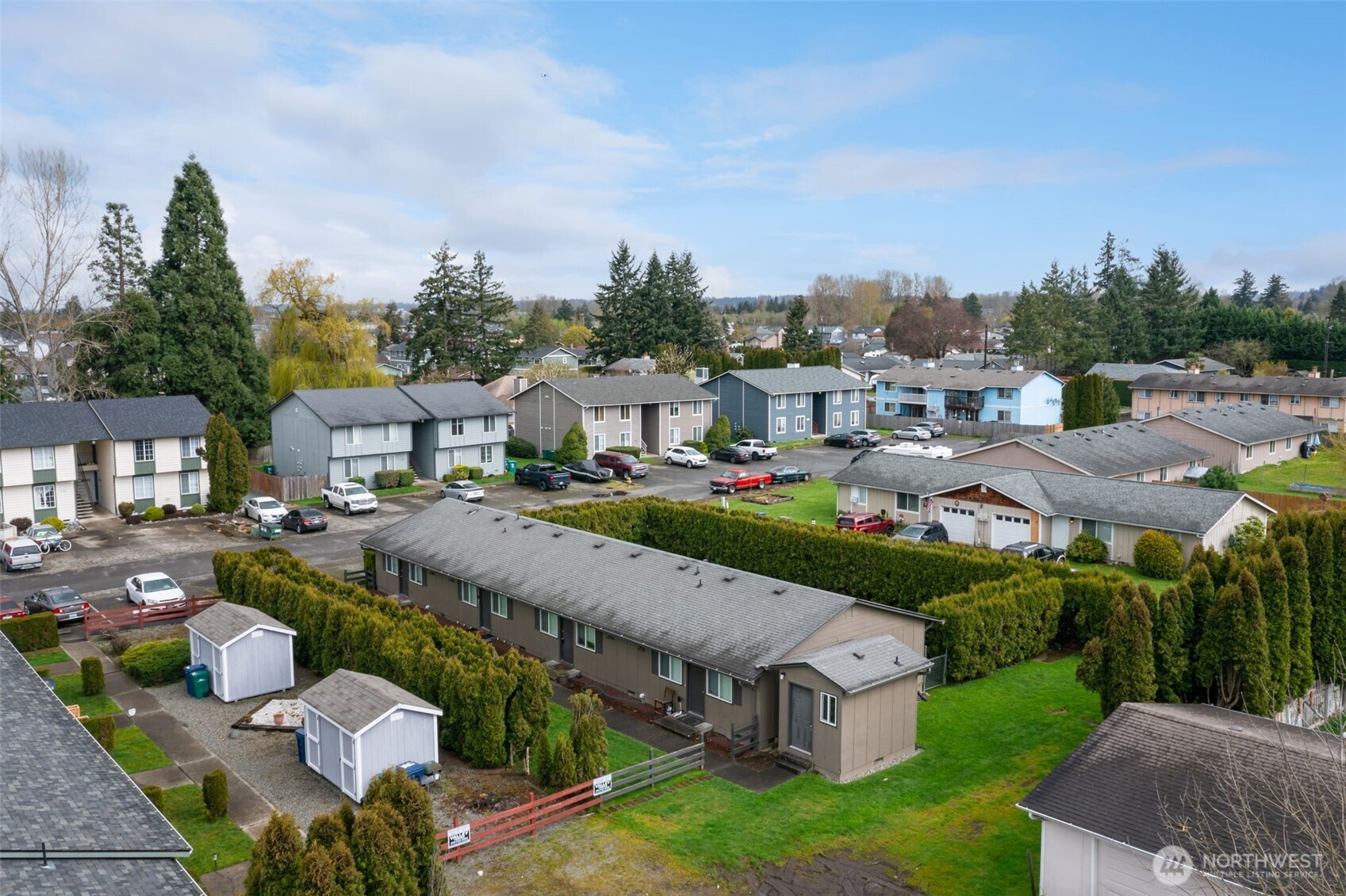 218 3rd Avenue Southwest Pacific, WA 98047 - Photo 2 of 16 a view of a garden with houses
