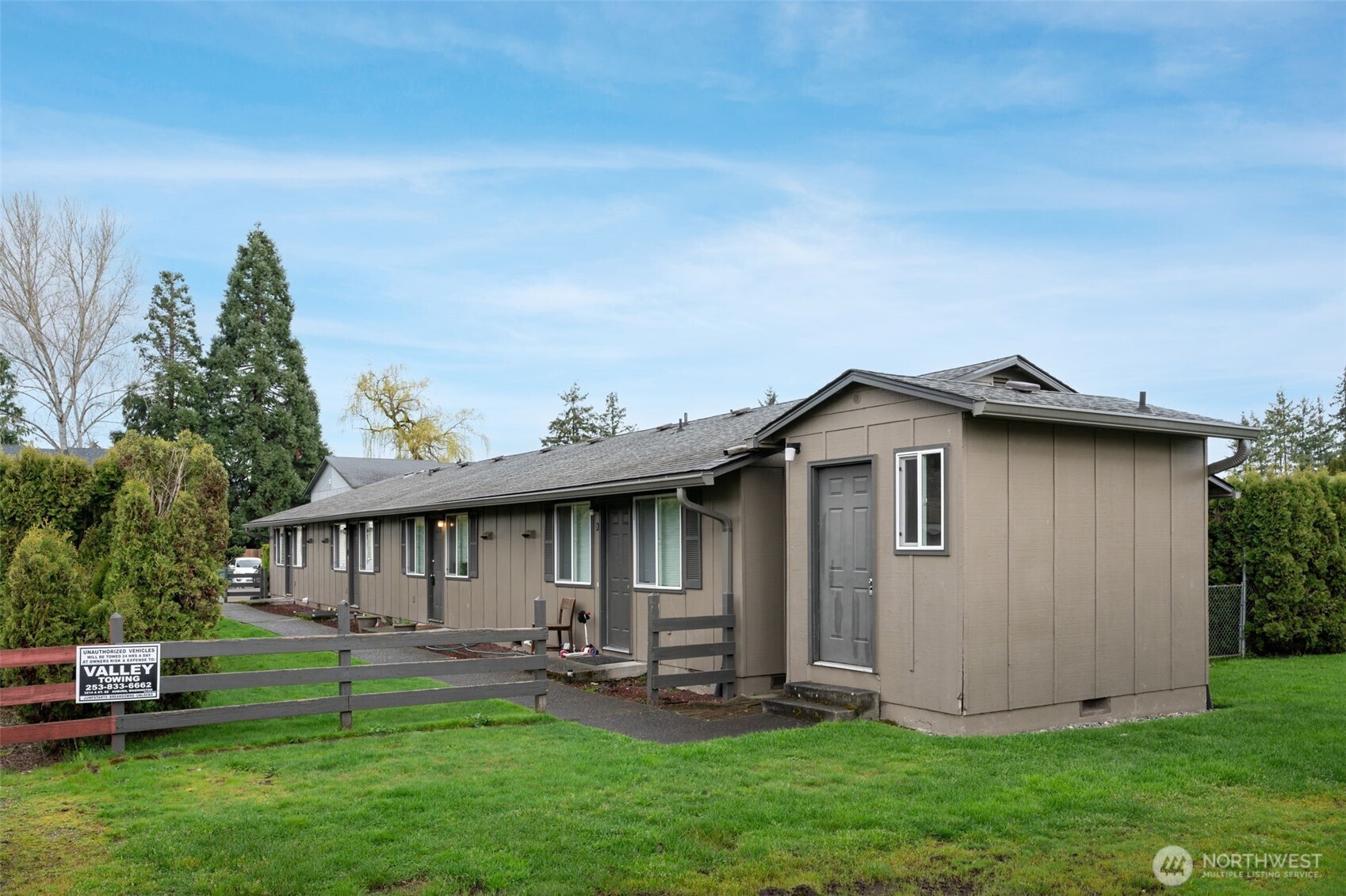 218 3rd Avenue Southwest Pacific, WA 98047 - Photo 6 of 16 a view of a house with a yard and sitting area