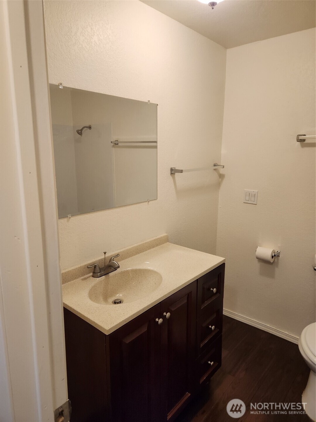218 3rd Avenue Southwest Pacific, WA 98047 - Photo 10 of 16 a bathroom with a sink toilet and vanity
