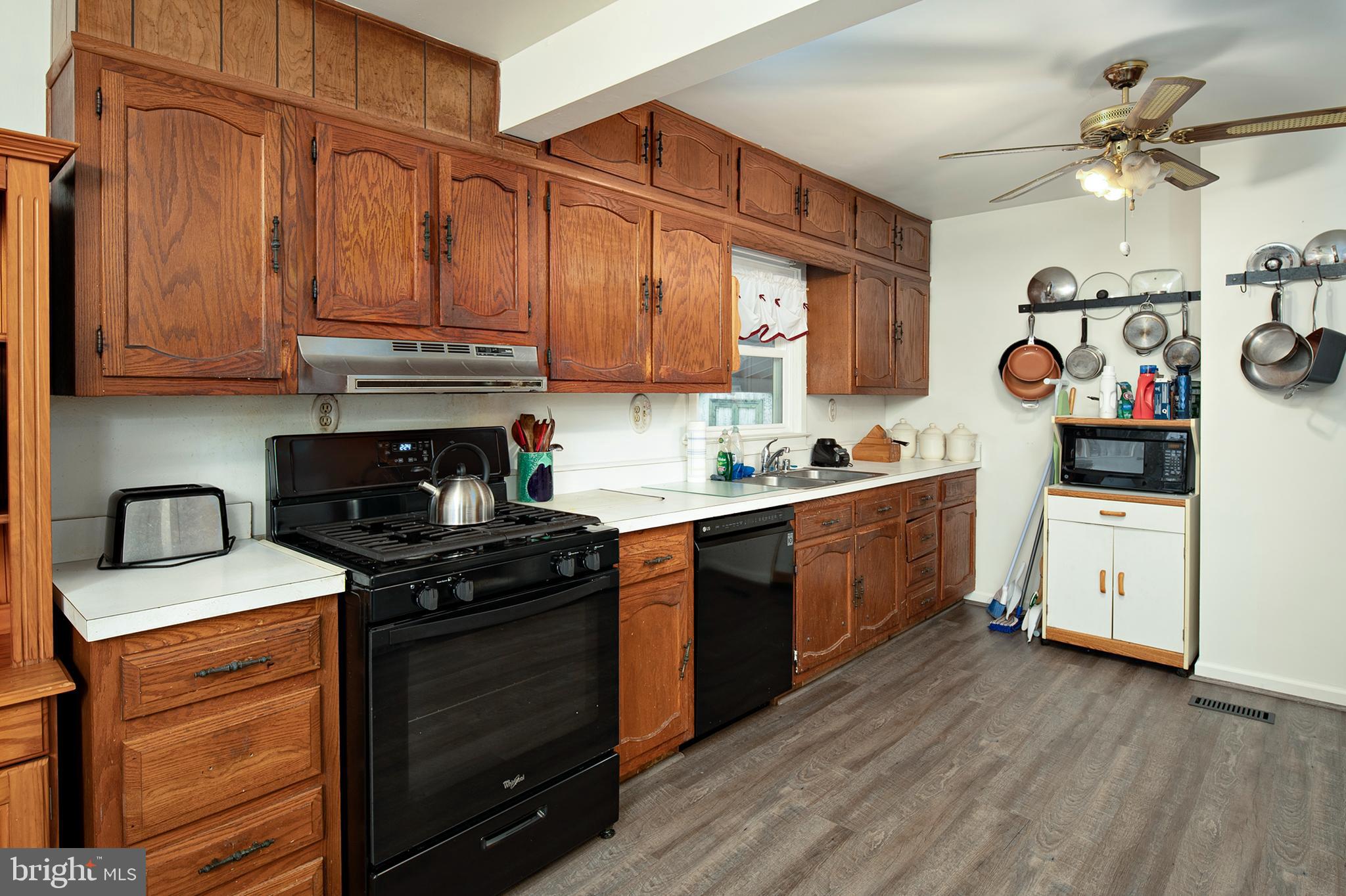 7508 Harmans Road Harmans, MD 21077 - Photo 11 of 23 Ample kitchen space with convenient laundry