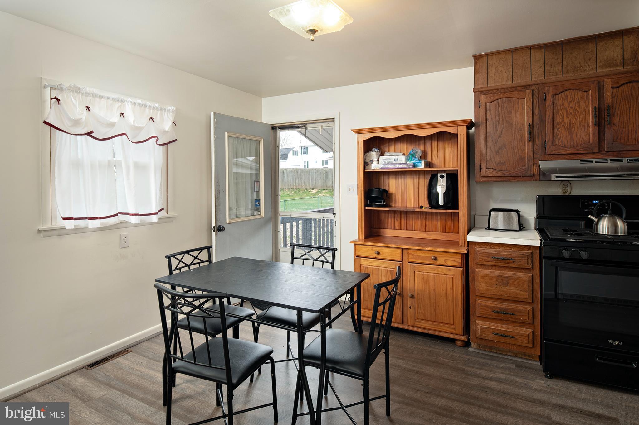 7508 Harmans Road Harmans, MD 21077 - Photo 8 of 23 Eat in kitchen with beautiful LVP flooring
