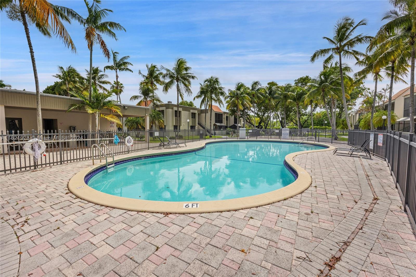 7927 Southwest 104th Street, Unit 108E Miami, FL 33156 - Photo 3 of 17 a view of outdoor space swimming pool and patio