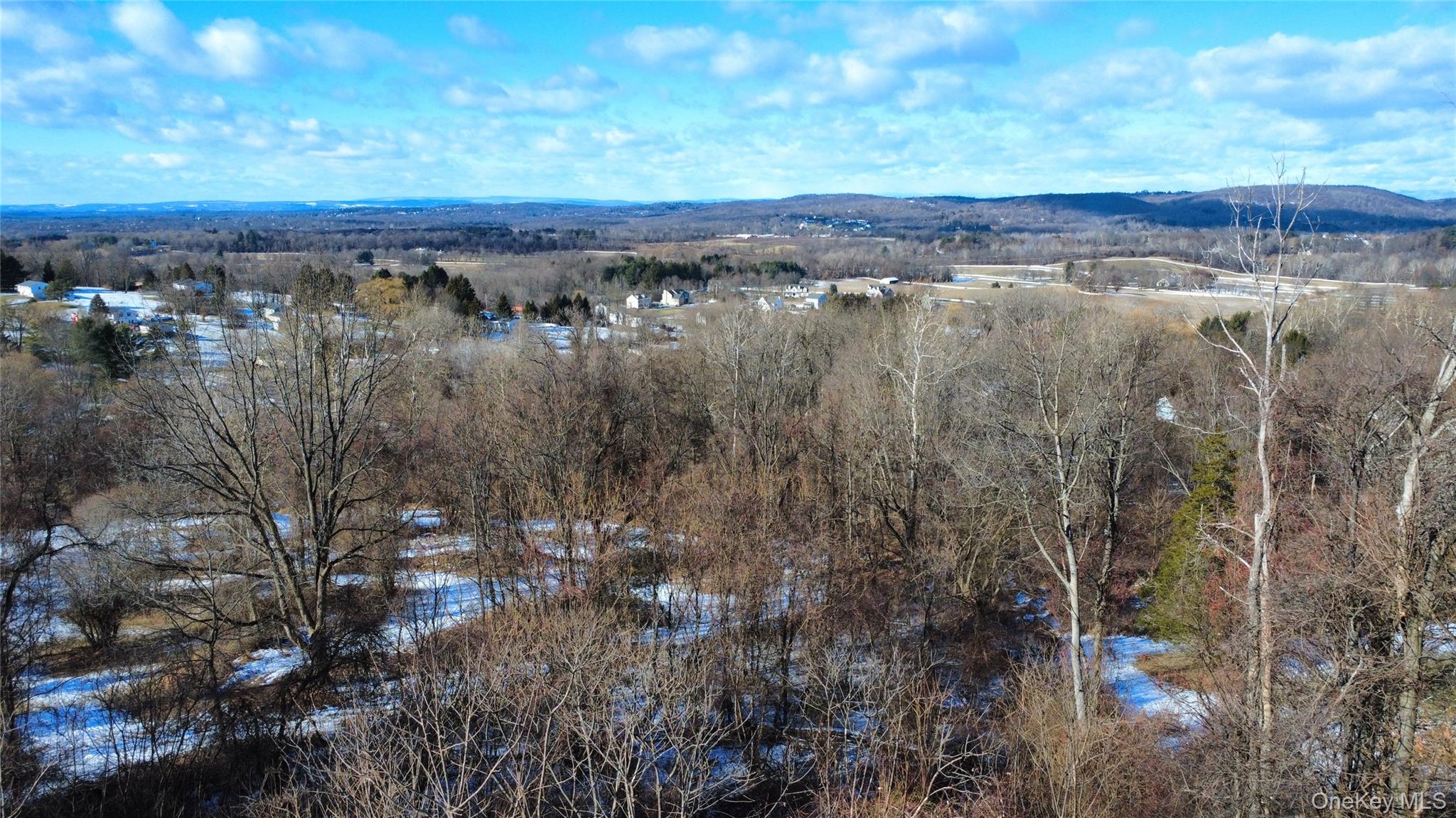 39 Brothers Road Poughquag, NY 12570 - Photo 11 of 21 a view of a lake in middle of forest