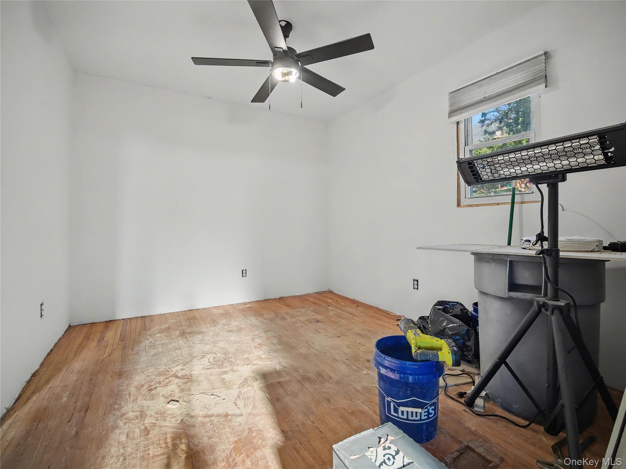 39 Brothers Road Poughquag, NY 12570 - Photo 18 of 18 Unfurnished room with wood finished floors and a ceiling fan