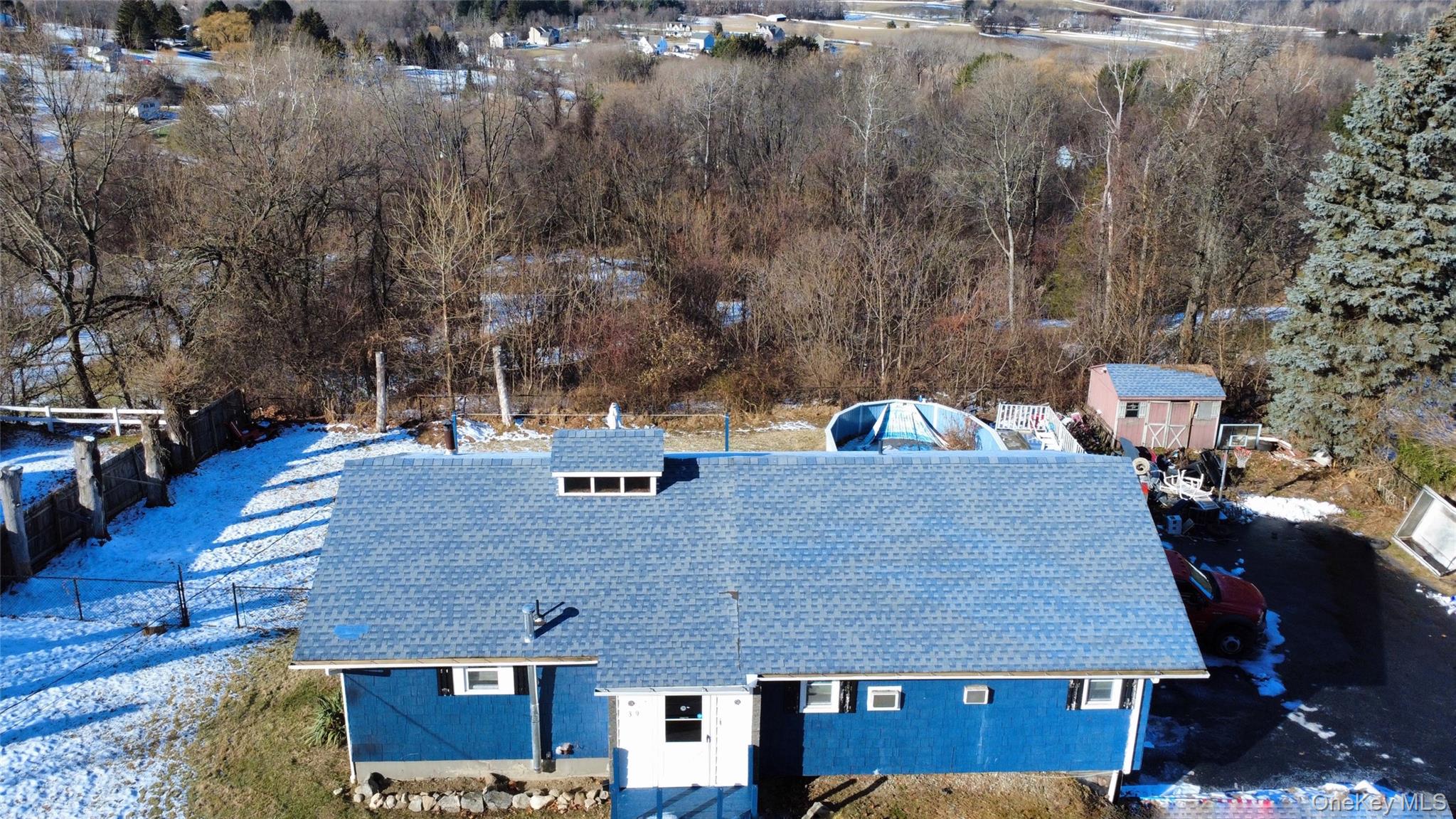 39 Brothers Road Poughquag, NY 12570 - Photo 4 of 21 a aerial view of a house with a yard and sitting area