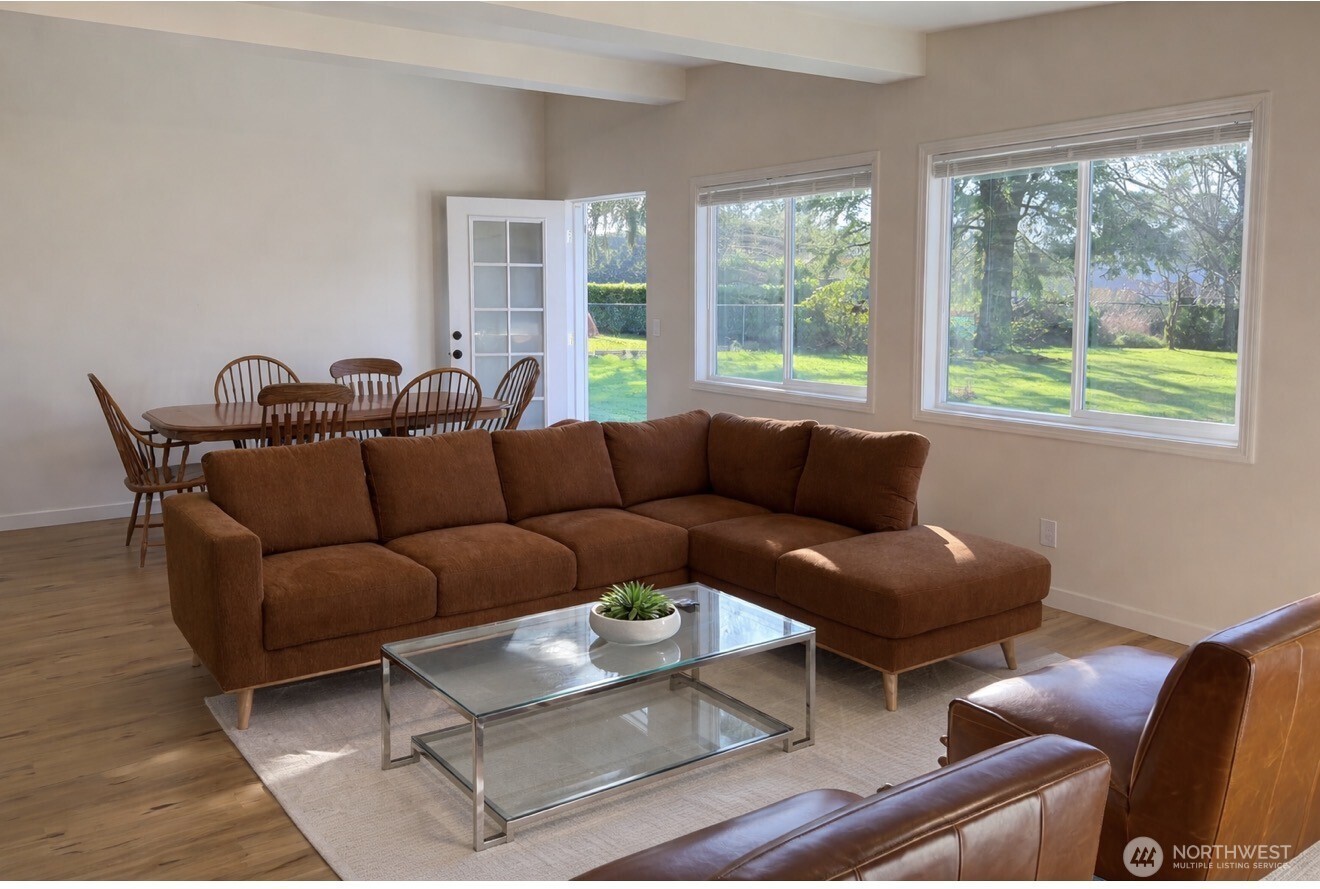 630 7th Avenue Forks, WA 98331 - Photo 7 of 39 a living room with furniture and a window