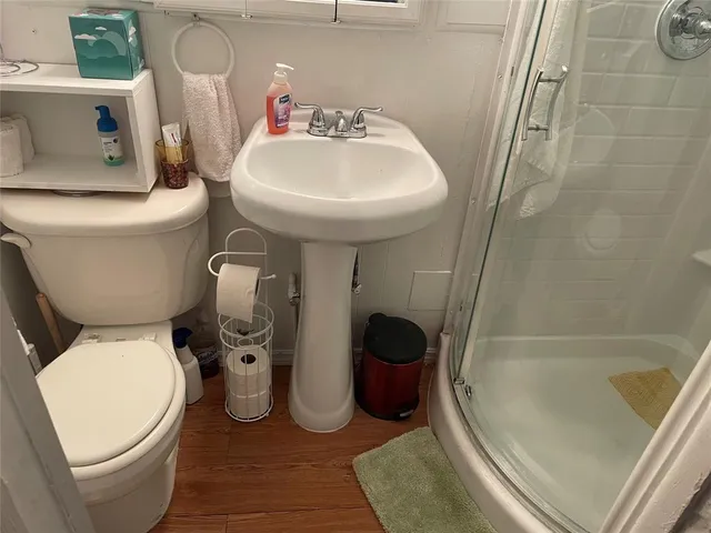 a bathroom with a toilet and a sink