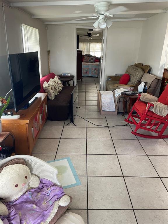 8620 Southwest 22nd Street Davie, FL 33324 - Photo 10 of 11 a living room with furniture and a flat screen tv