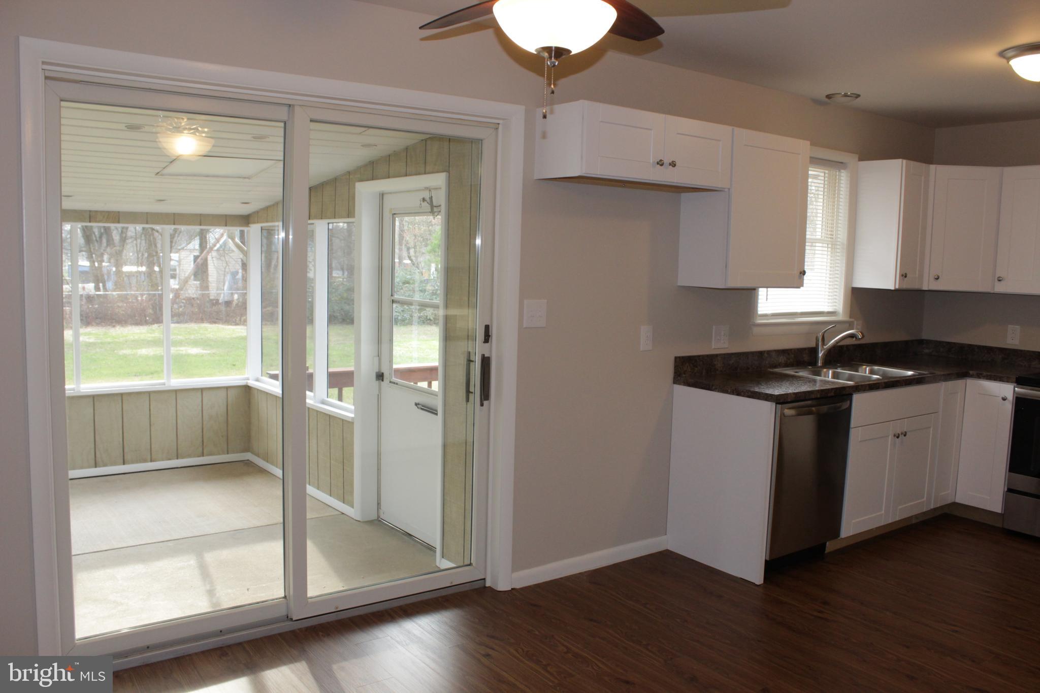 1750 Campus Road Elizabethtown, PA 17022 - Photo 14 of 41 a view of a kitchen with wooden floor and a window