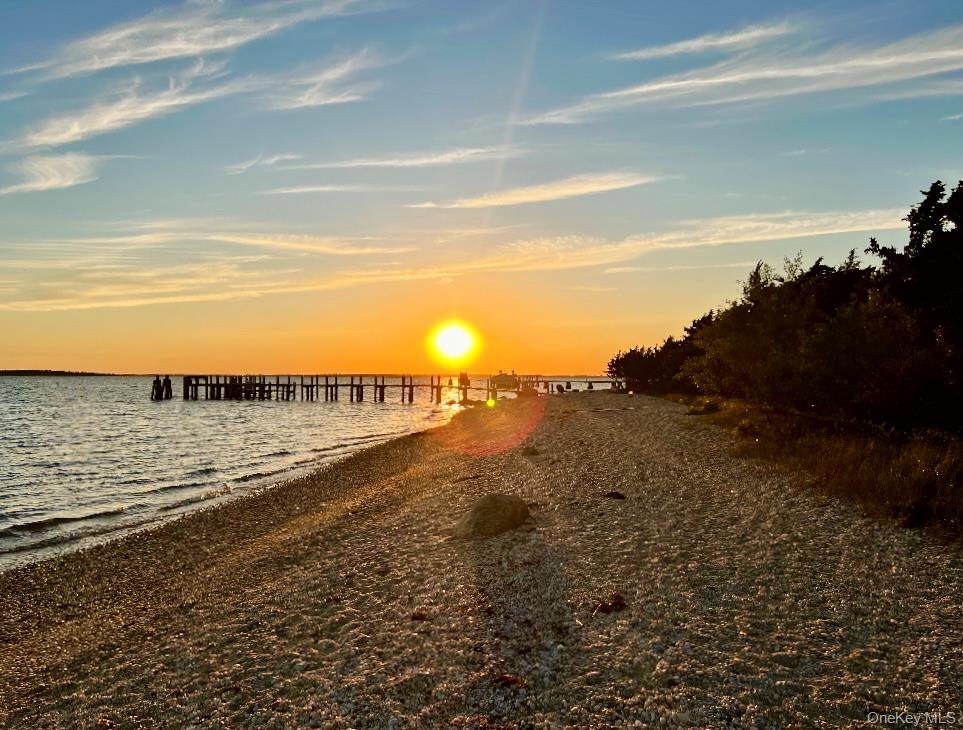 91 Sunset Beach Road Sag Harbor, NY 11963 - Photo 16 of 16 a view of an ocean beach