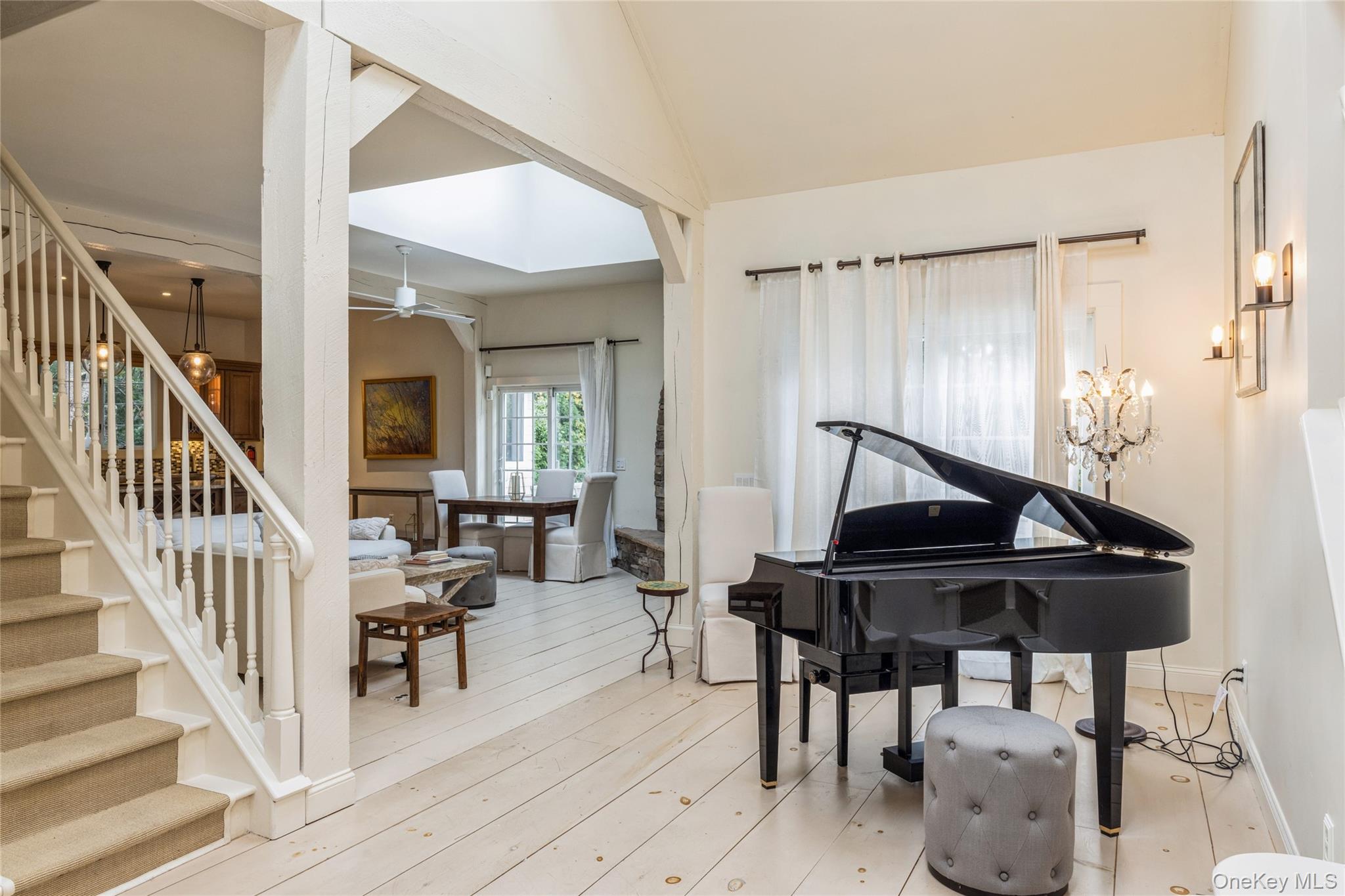 91 Sunset Beach Road Sag Harbor, NY 11963 - Photo 2 of 16 a living room with furniture and wooden floor