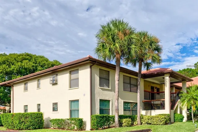 a view of a house with a garden
