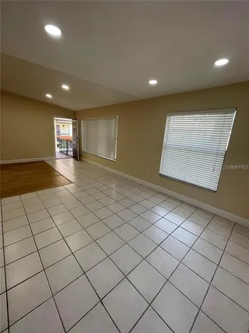 a view of an empty room and window