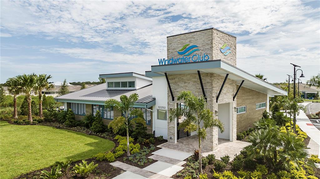 12459 49th Street East Parrish, FL 34219 - Photo 3 of 15 a front view of a house with garden