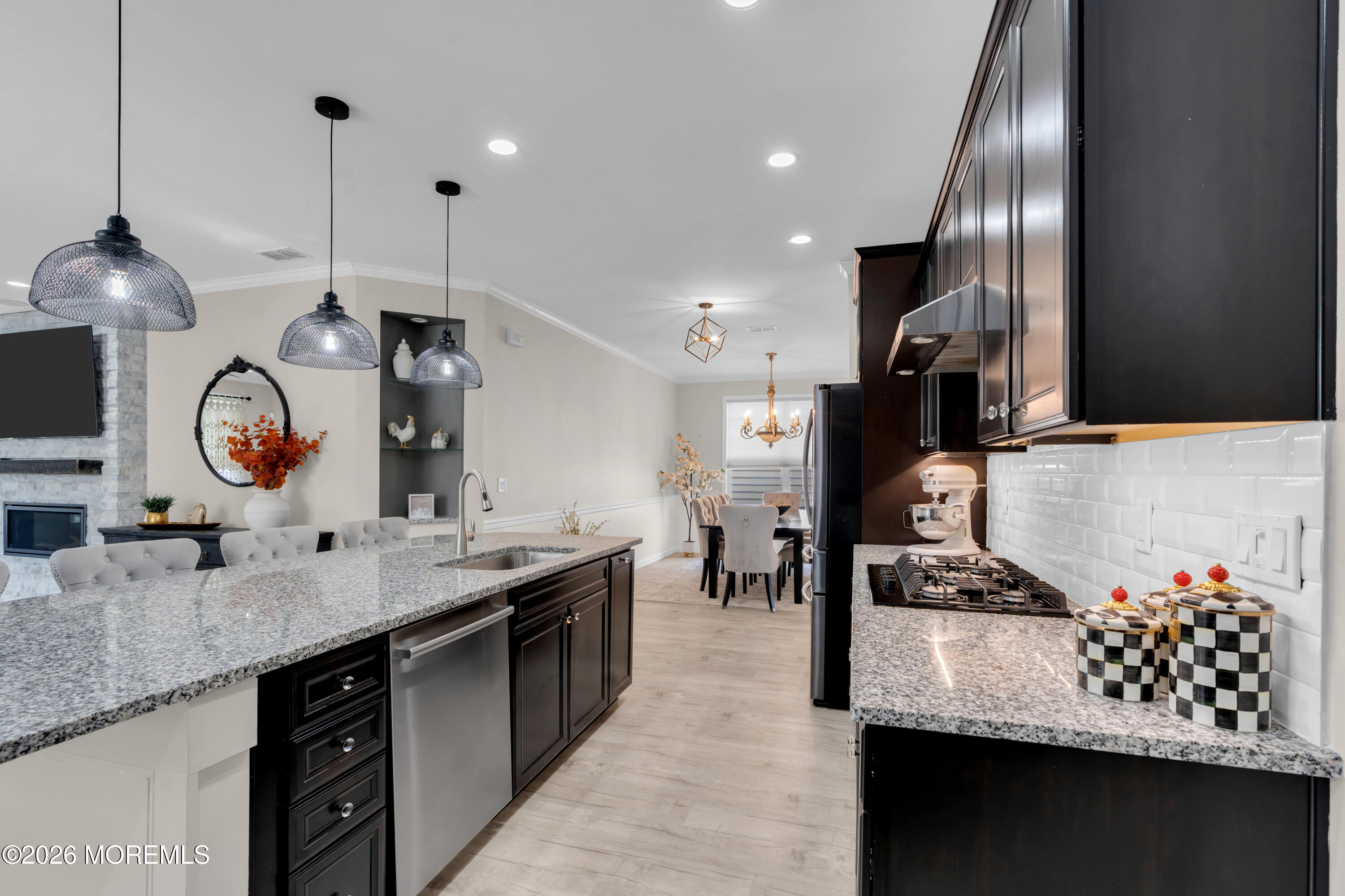 30 Harvest Ridge Road Howell, NJ 07731 - Photo 12 of 38 a kitchen with a sink granite counter top stainless steel appliances and cabinets