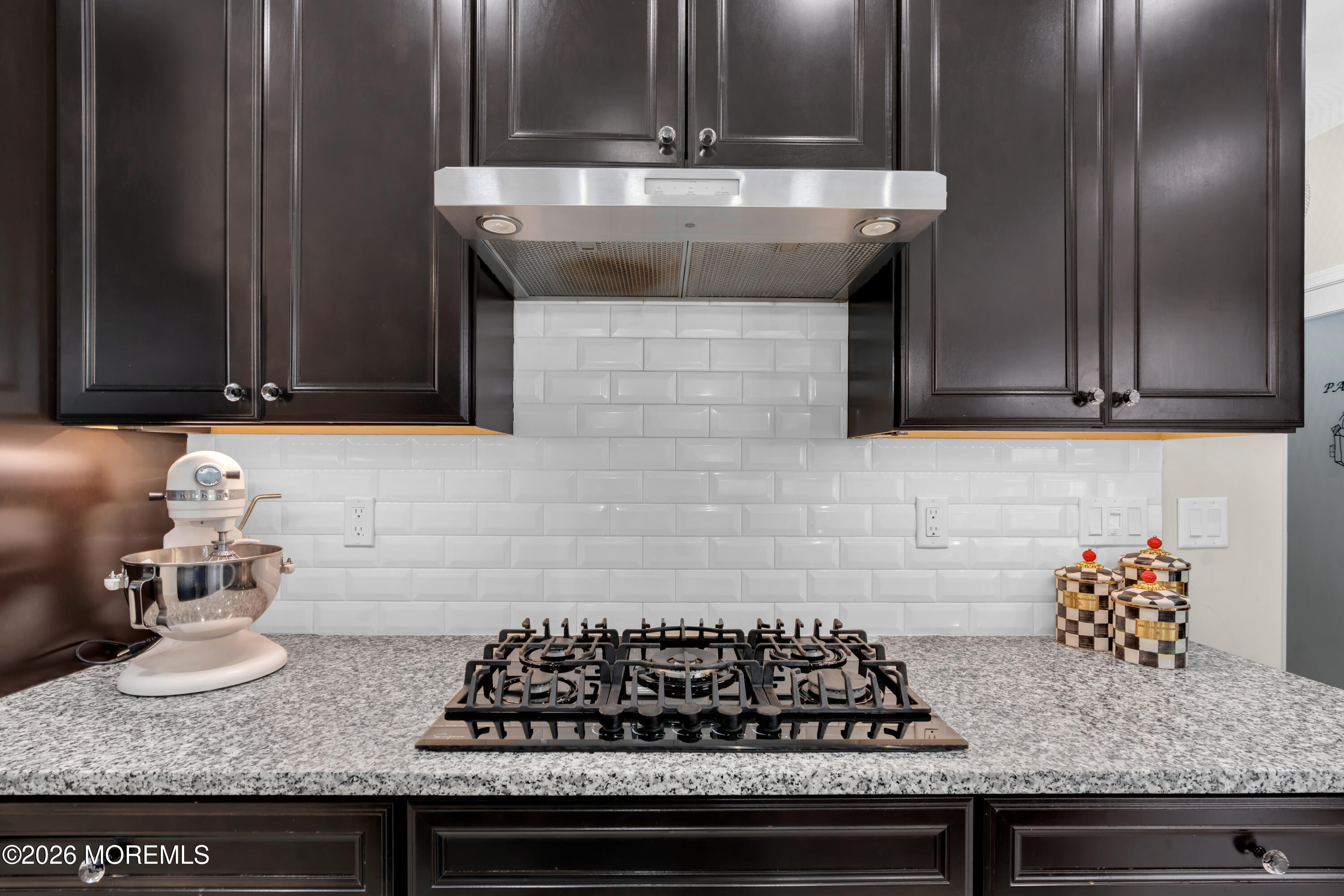 30 Harvest Ridge Road Howell, NJ 07731 - Photo 15 of 38 a kitchen with granite countertop a stove and cabinets