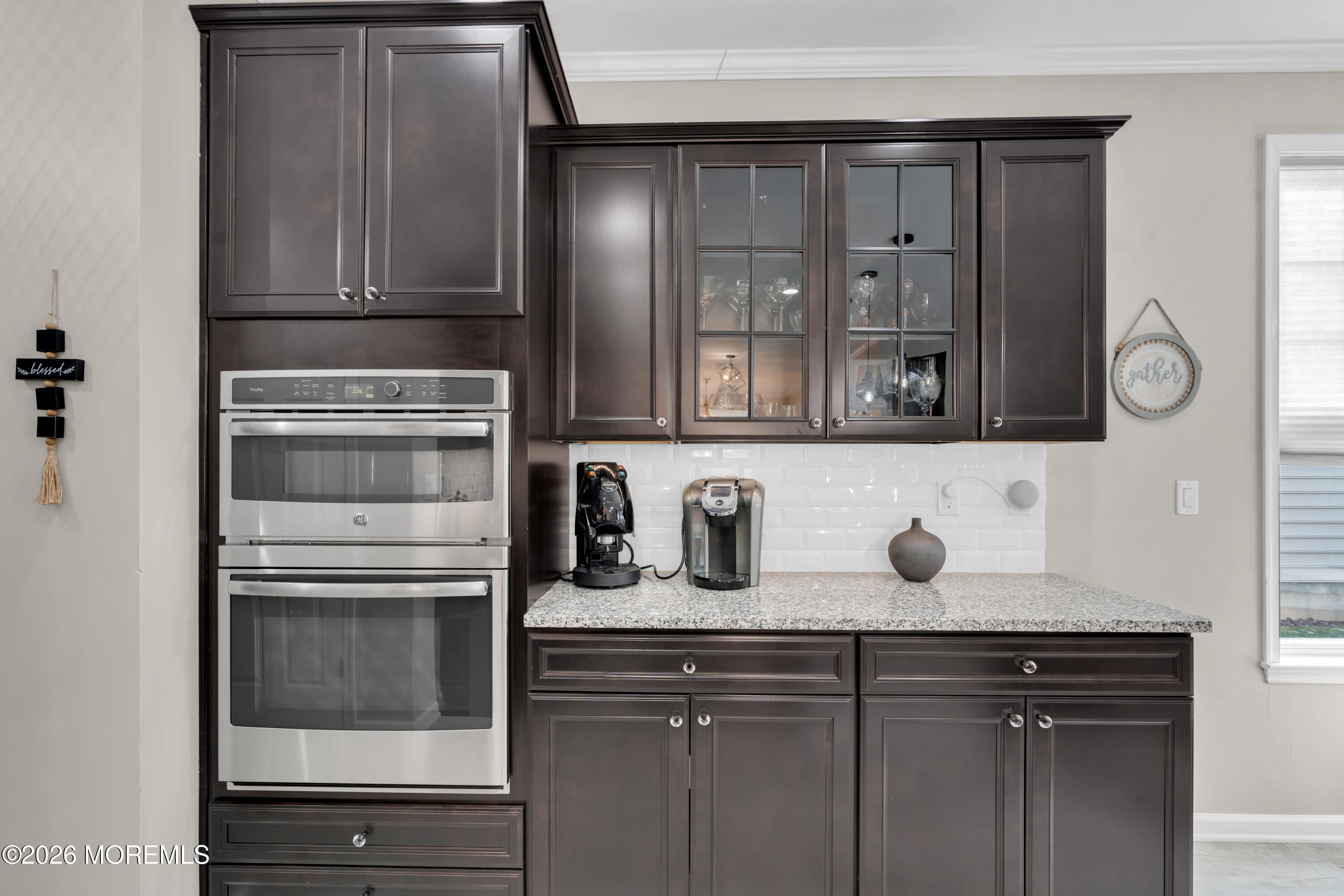 30 Harvest Ridge Road Howell, NJ 07731 - Photo 16 of 38 a kitchen with a sink and cabinets