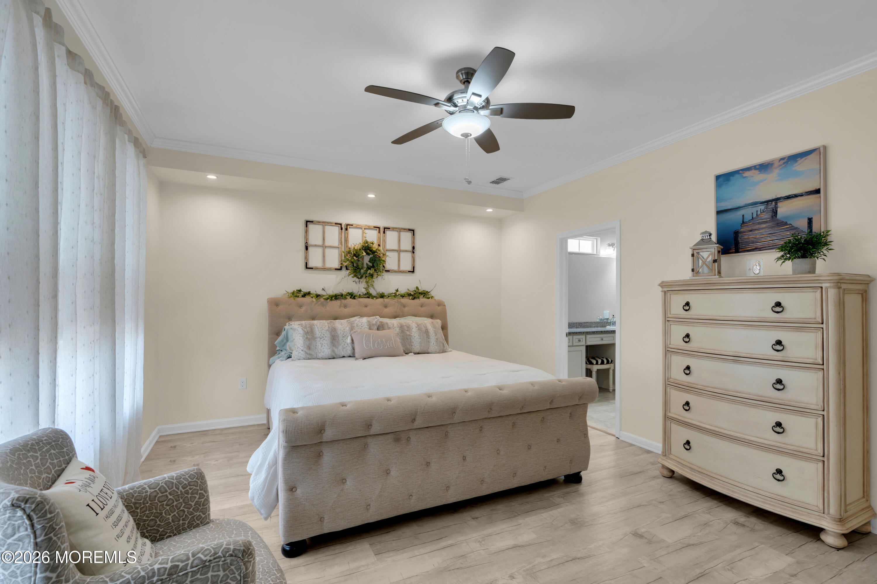 30 Harvest Ridge Road Howell, NJ 07731 - Photo 22 of 38 a bedroom with a bed a couch and ceiling fan