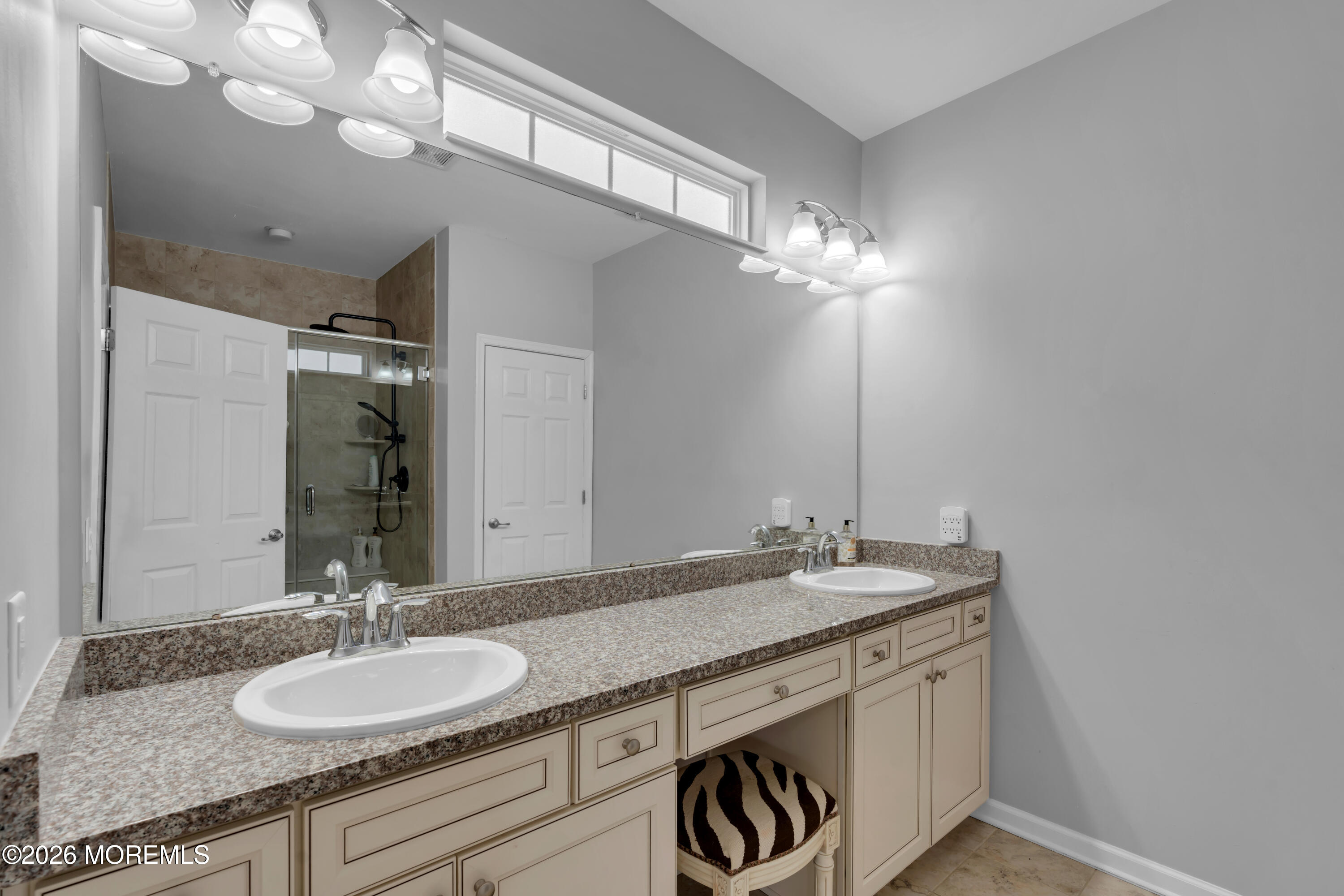 30 Harvest Ridge Road Howell, NJ 07731 - Photo 24 of 38 a bathroom with a granite countertop double vanity and a mirror