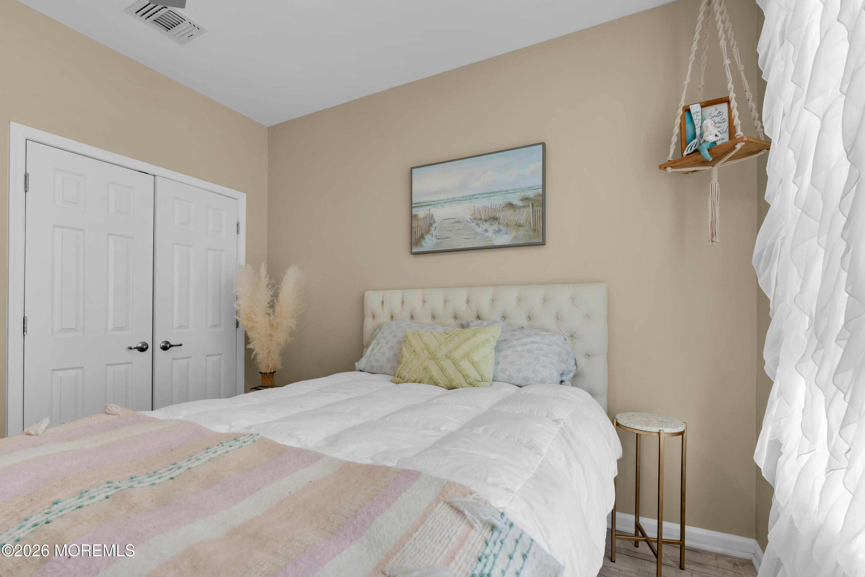 30 Harvest Ridge Road Howell, NJ 07731 - Photo 27 of 38 a bedroom with a bed and a painting on the wall