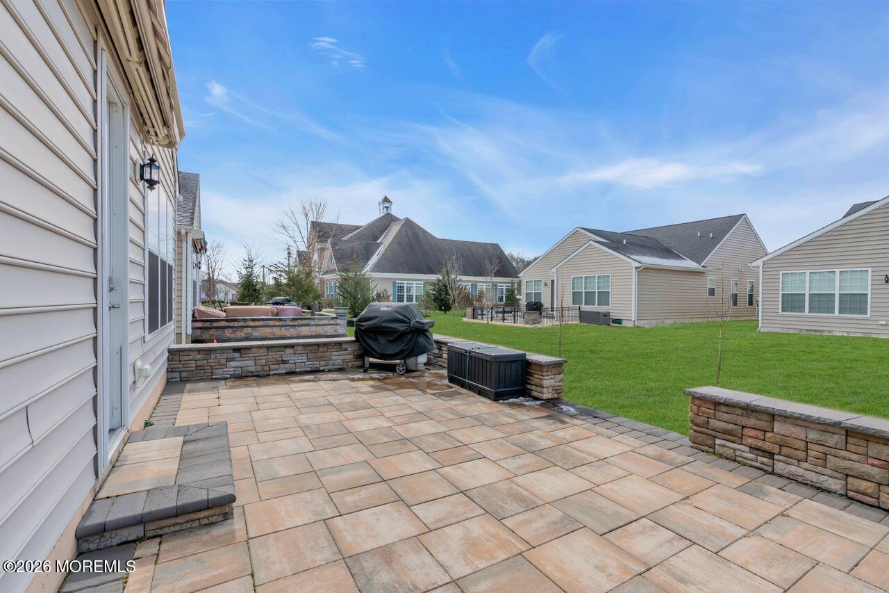 30 Harvest Ridge Road Howell, NJ 07731 - Photo 30 of 38 a view of an house with backyard space and garden