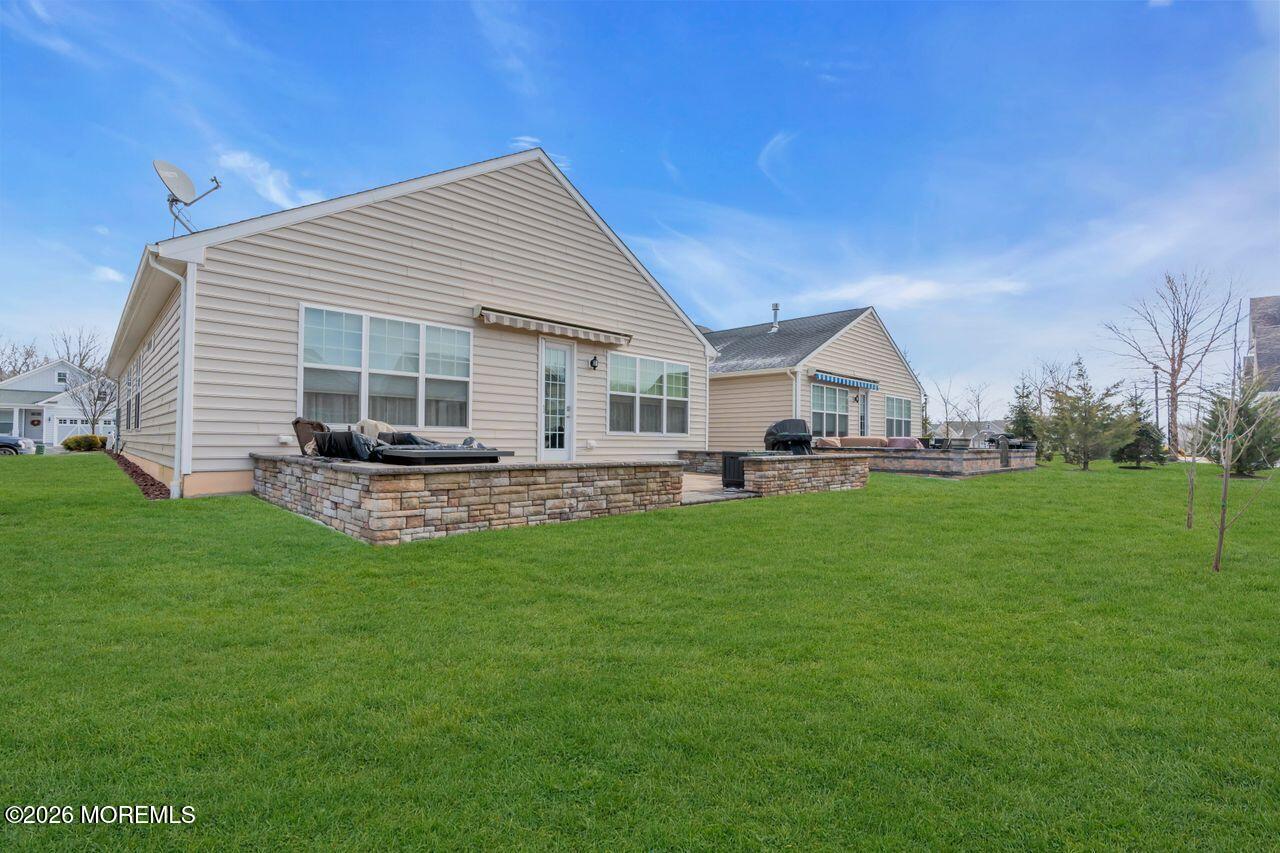 30 Harvest Ridge Road Howell, NJ 07731 - Photo 32 of 38 a view of a house with a back yard