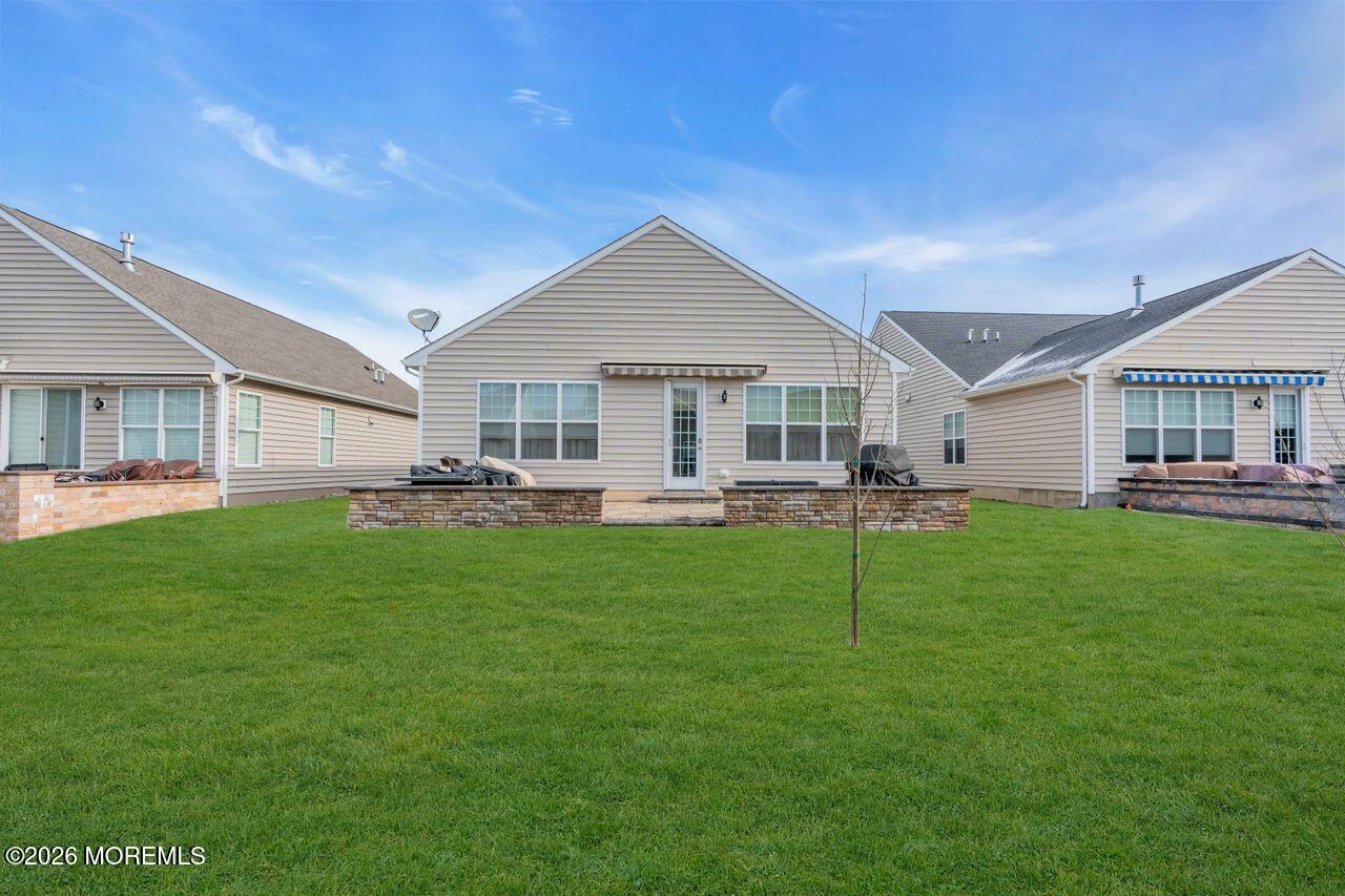 30 Harvest Ridge Road Howell, NJ 07731 - Photo 33 of 38 a view of a house with a backyard