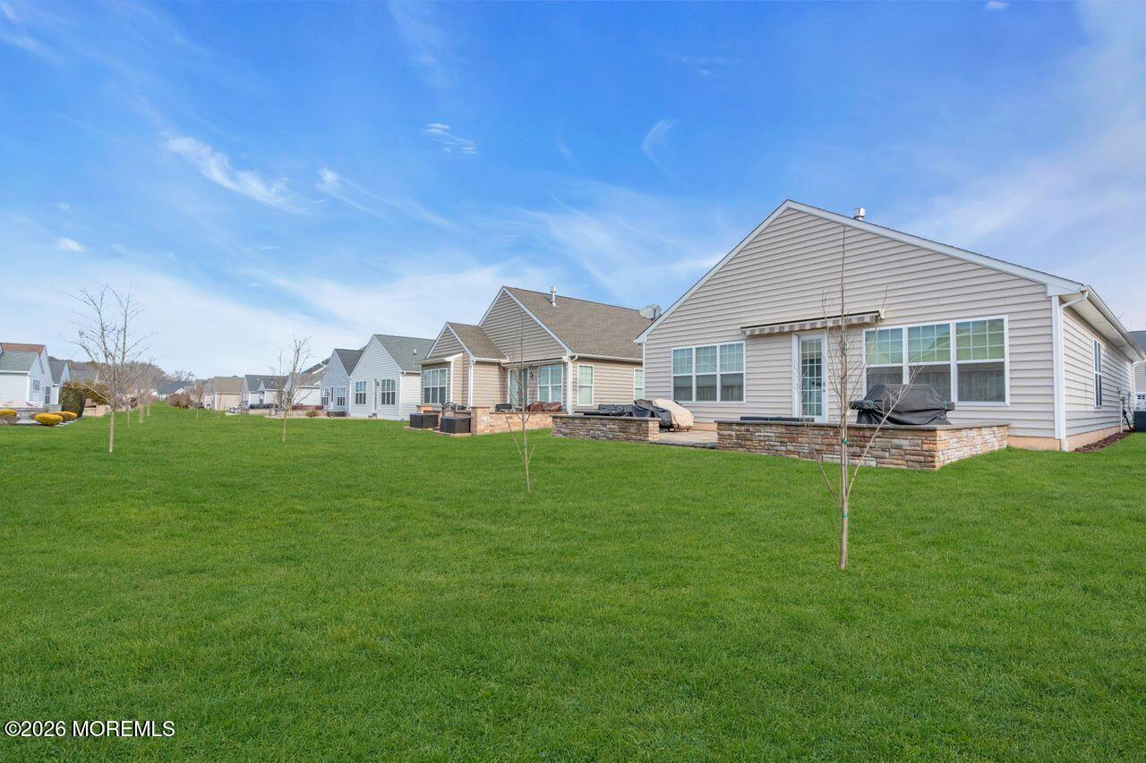 30 Harvest Ridge Road Howell, NJ 07731 - Photo 34 of 38 a view of a house with a yard porch and sitting area