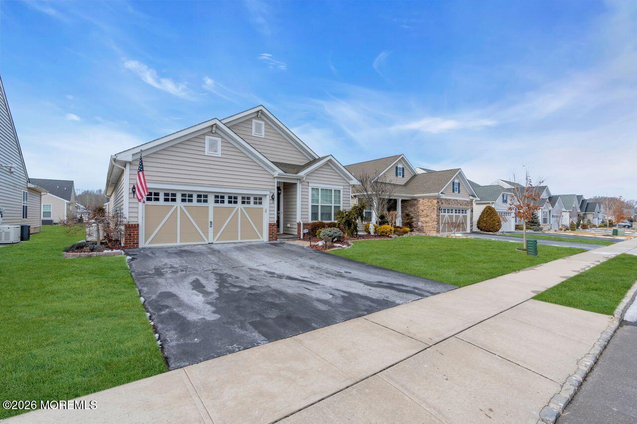 30 Harvest Ridge Road Howell, NJ 07731 - Photo 35 of 38 a view of house with garden