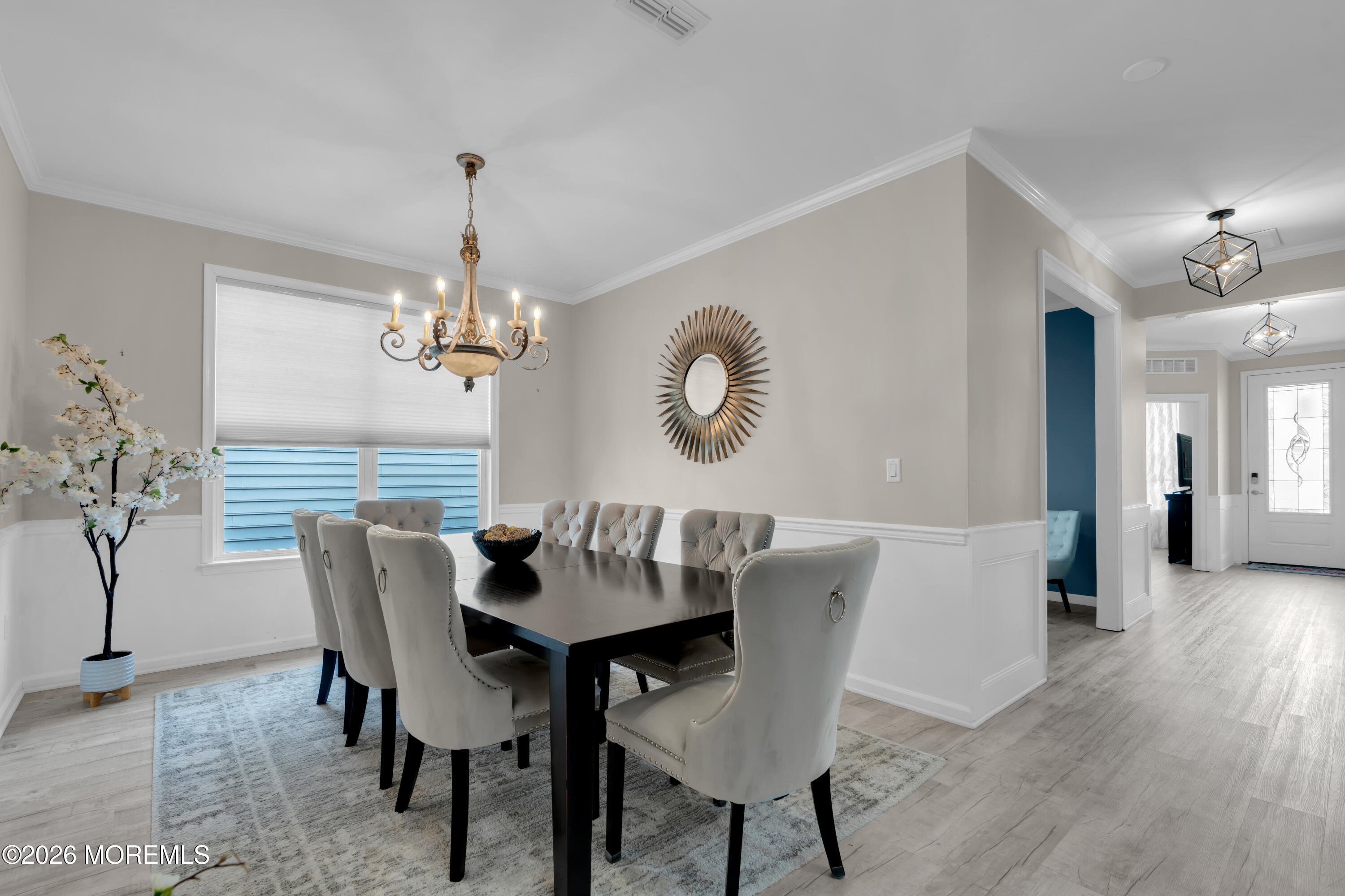 30 Harvest Ridge Road Howell, NJ 07731 - Photo 7 of 38 a view of a dining room with furniture a chandelier and wooden floor